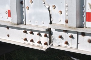 Fatigue fracture of improperly-repaired truck trailer side rail